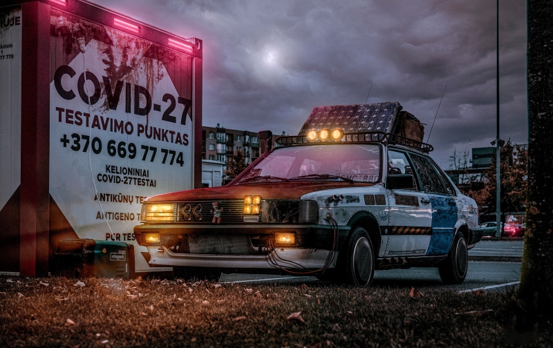 Cyberpunk COVID-27 testing station with modified car