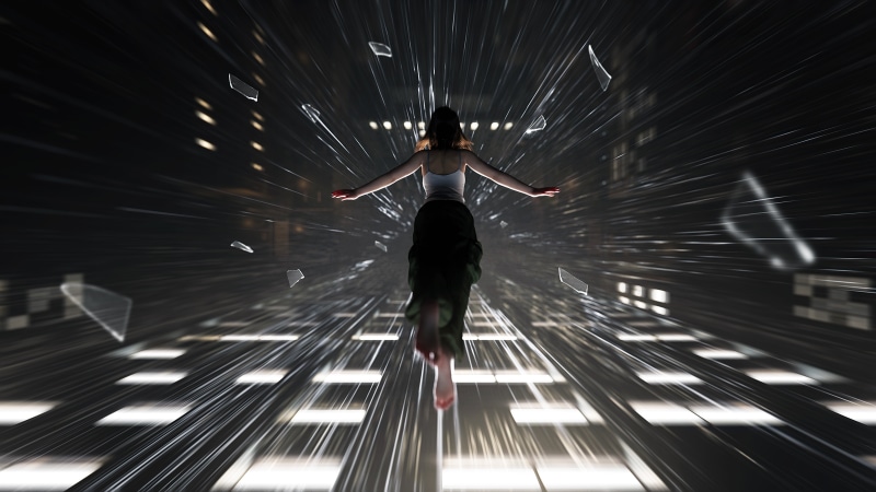Woman floating through abstract tunnel