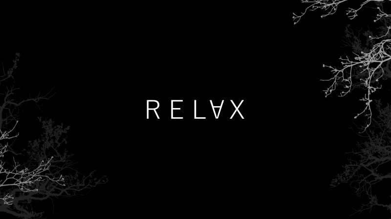 RELAX typography on black background with branches