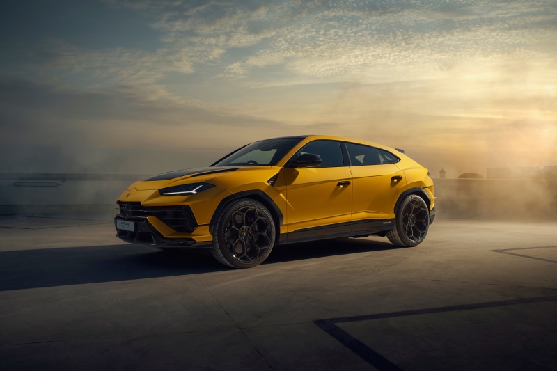 Yellow Lamborghini Urus SUV on concrete