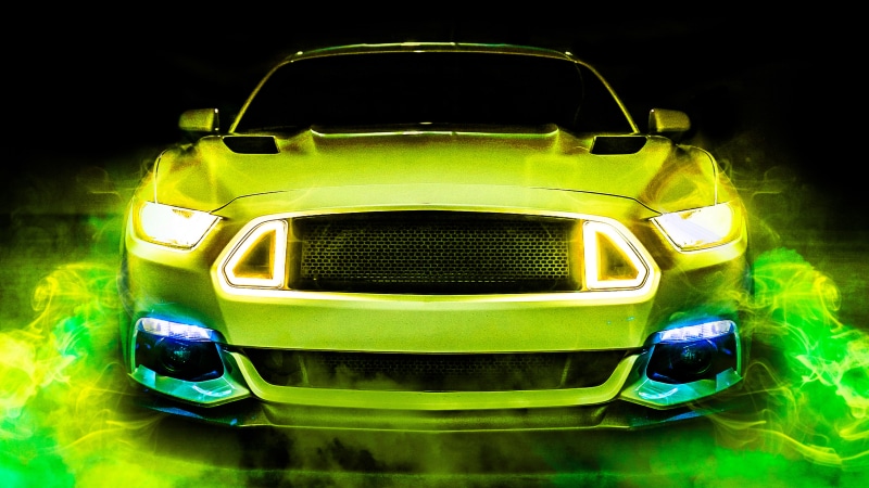Green Ford Mustang with smoke