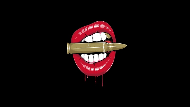 Red lips biting a bullet