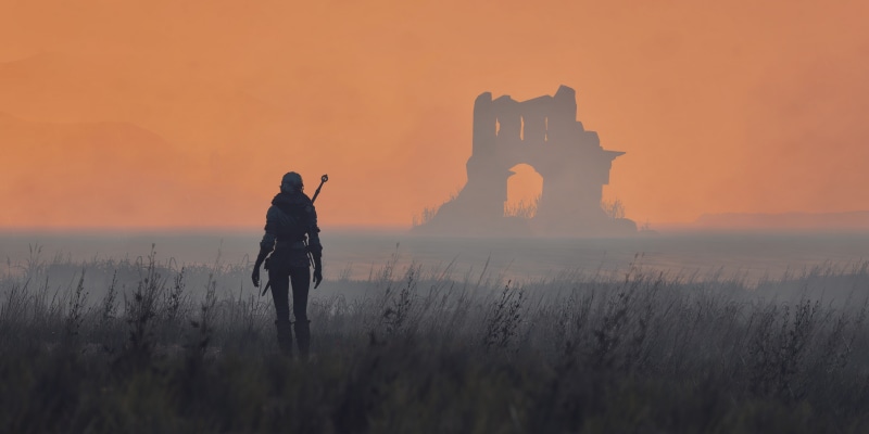 Geralt of Rivia from The Witcher 3 in a foggy landscape