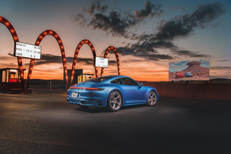 Blue Porsche 911 at Drive-In Theater