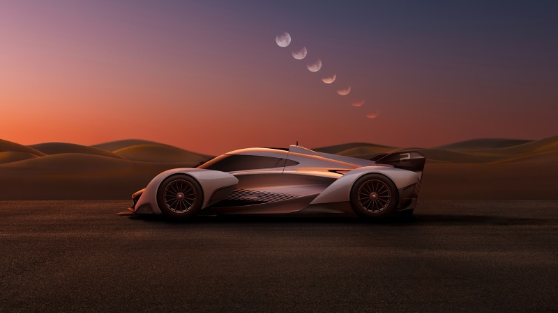 McLaren Solus GT race car in desert landscape at sunset