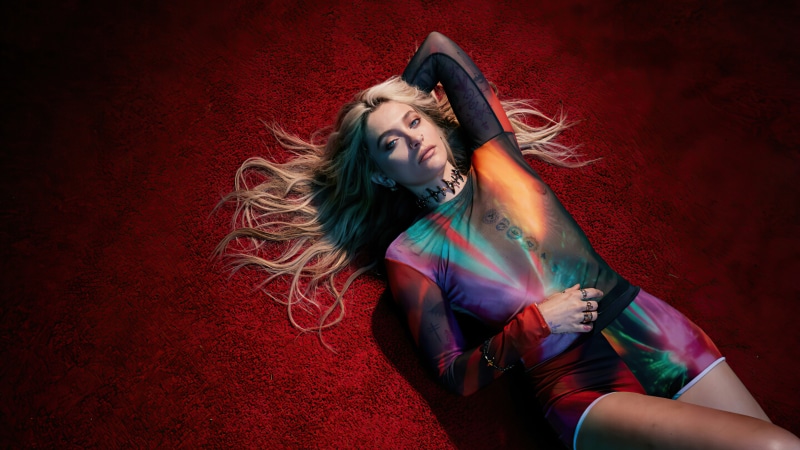Paris Jackson lying on red carpet