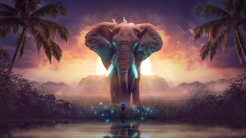 Fantasy elephant with glowing tusks and eyes at sunset