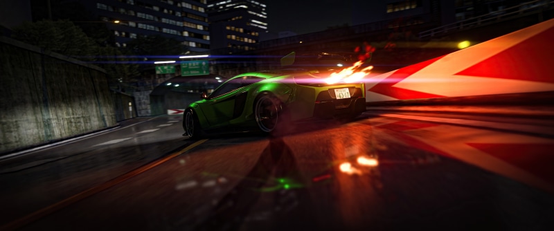 Green McLaren 650S with flames on city street