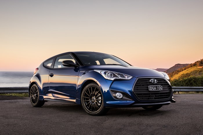 Hyundai Veloster Blue Sport Car at Sunset 4K