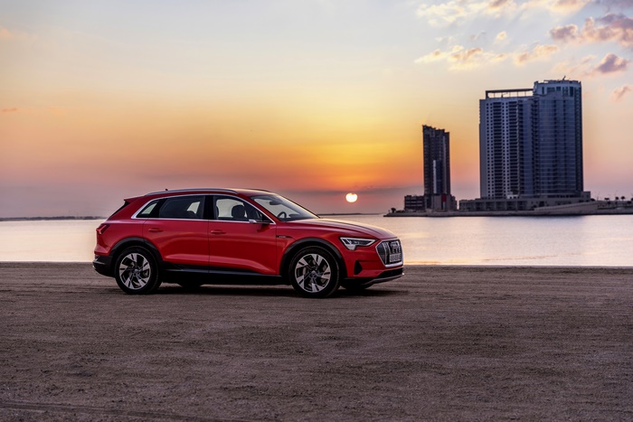 Audi E-Tron Electric SUV Sunset Cityscape