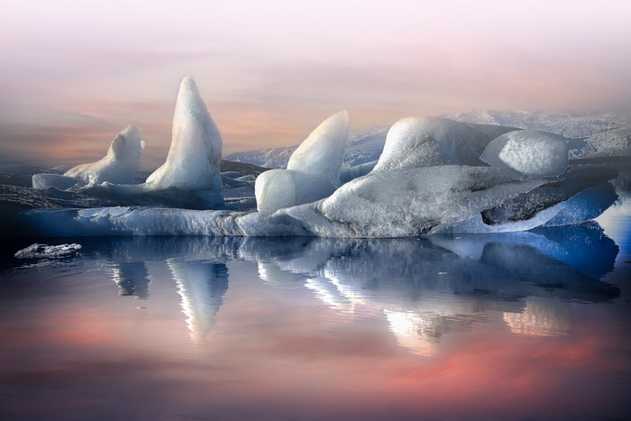 Icefloe Reflections under a Pink Sky