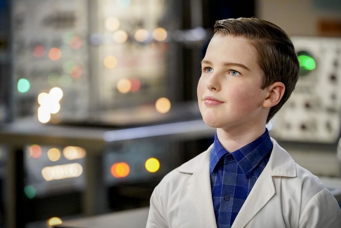 Young Sheldon Cooper in a lab coat