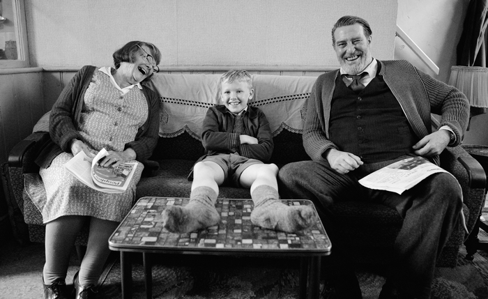 Judi Dench, Jude Hill, Ciarán Hinds laughing in Belfast
