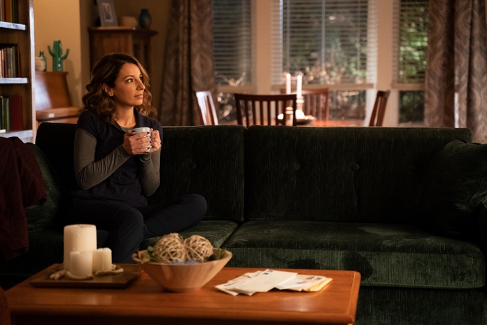 Vanessa Lengies on couch with mug in Turner and Hooch