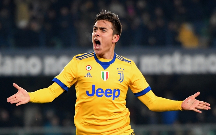 Paulo Dybala in Juventus F.C. yellow kit reacting