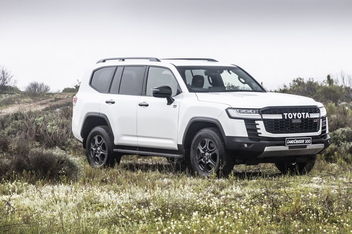 White Toyota Land Cruiser GR-S 300 SUV in field
