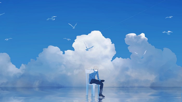Boy sitting on chair in a serene blue cloudscape