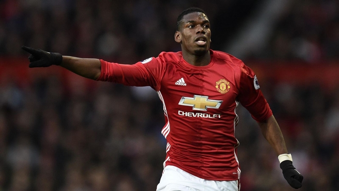 Paul Pogba pointing in Manchester United kit