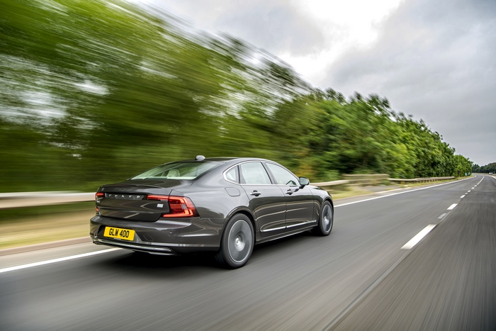 Volvo S90 luxury car speeding on highway