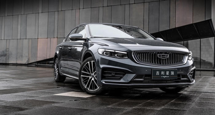 Dark grey Geely Preface sedan parked in urban setting