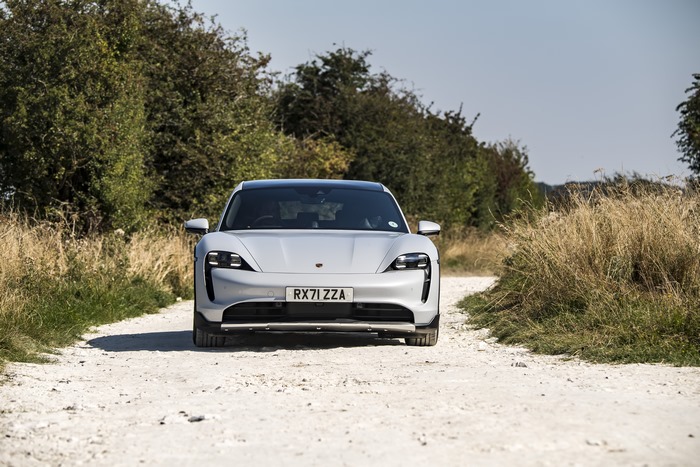 Porsche Taycan 4S: White sport car on a country road