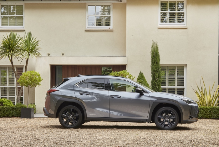 Lexus UX 250H Luxury SUV parked at a house