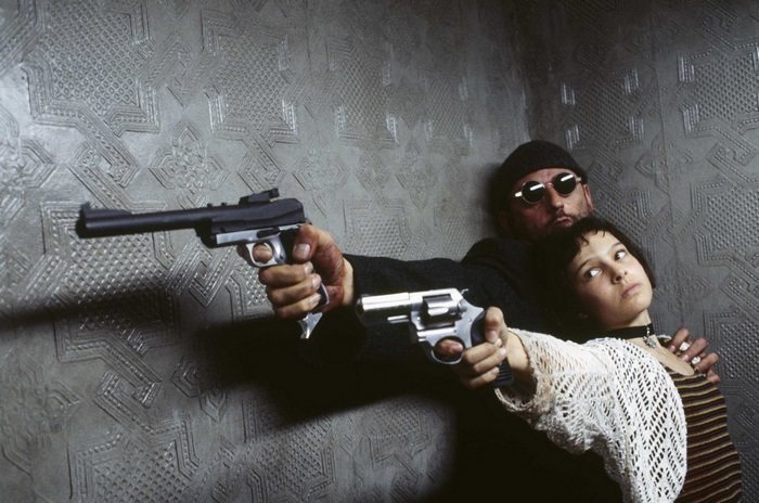 Leon and Mathilda aiming guns in The Professional