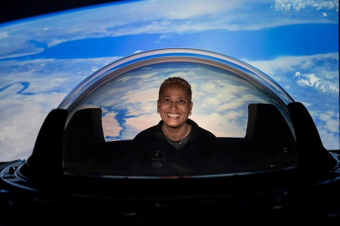 Inspiration4 crew member smiles at Earth from space