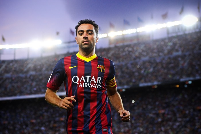 Xavi in FC Barcelona kit at stadium