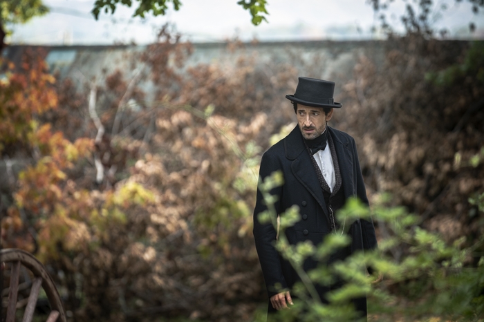 Adrien Brody looking worried in Chapelwaite