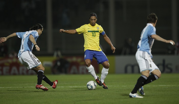 Ronaldinho dribbles for Brazil against Argentina