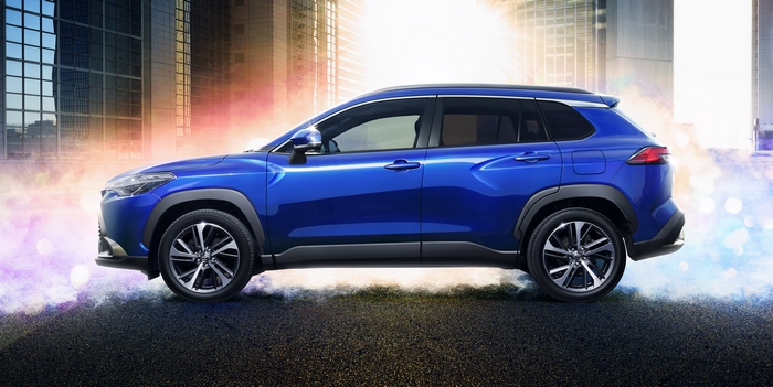 Blue Toyota Corolla Cross Hybrid SUV city 4K
