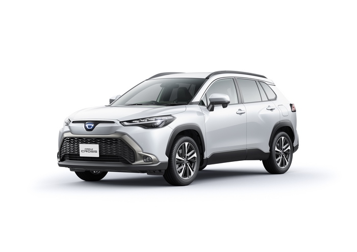 White Toyota Corolla Cross Hybrid SUV 4K