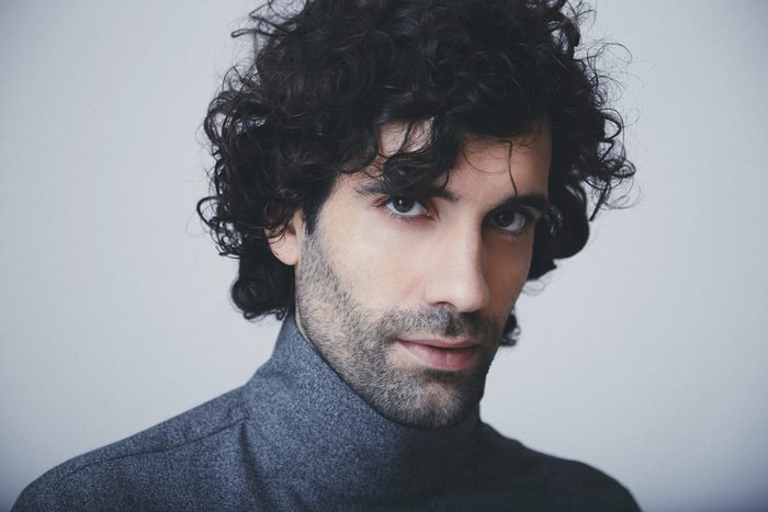 Tamar Novas, Spanish actor, in grey turtleneck
