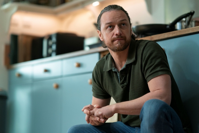 James McAvoy looking thoughtful in a kitchen
