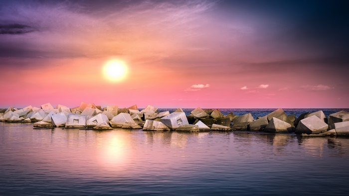 Seashore Sunset with Tetrapod Breakwater