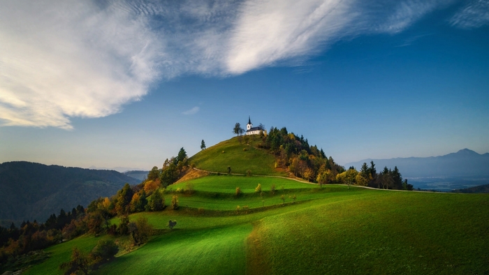 Scenic Sv. Jakob hill with church near Ljubljana, Slovenia