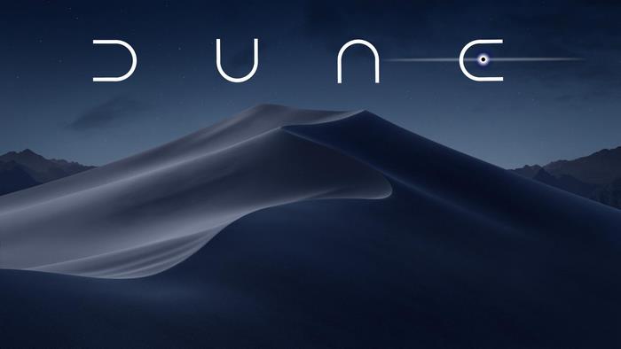 Dune (2021) logo over dark desert landscape