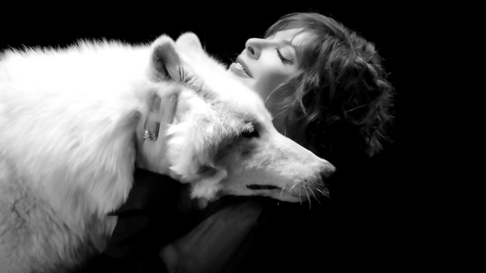 Mylene Farmer's Black and White Portrait with White Dog