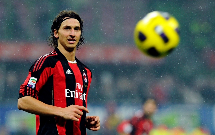 Zlatan Ibrahimovic playing for A.C. Milan in the rain