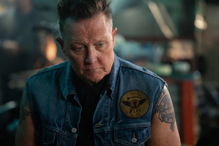 Robert Patrick with Heaven's Fist patch in The Protégé