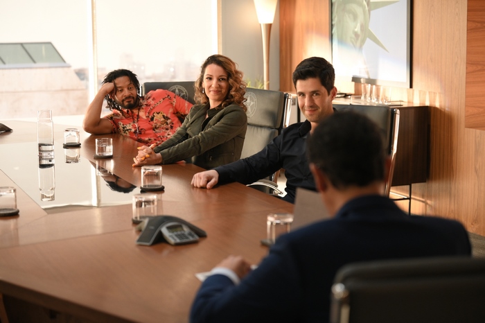 Turner and Hooch cast at a conference table