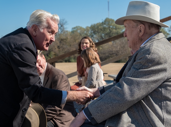Martin Sheen shaking hands in 12 Mighty Orphans