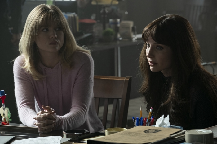 Annabelle Wallis and Maddie Hasson sitting at a table