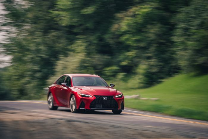 Red Lexus IS 500 F SPORT Performance luxury car in motion