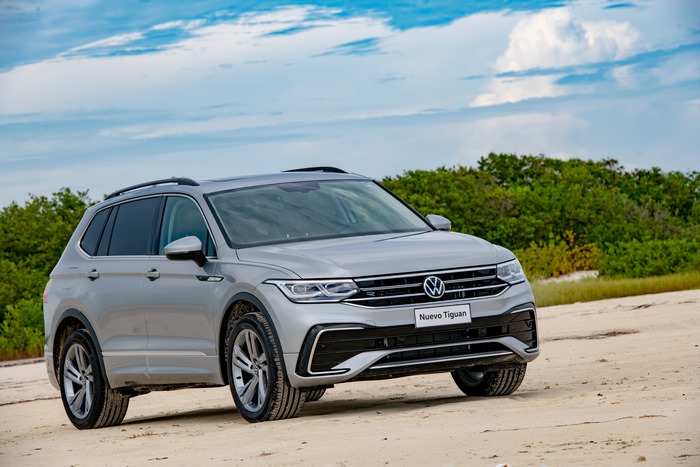 New Volkswagen Tiguan SUV on a sandy path
