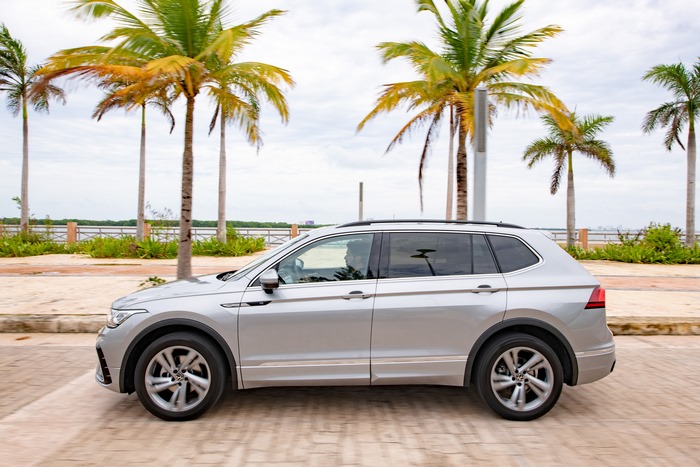 Silver Volkswagen Tiguan R-Line SUV on a coastal road