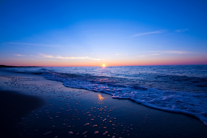 Vibrant sunset over the sea and beach
