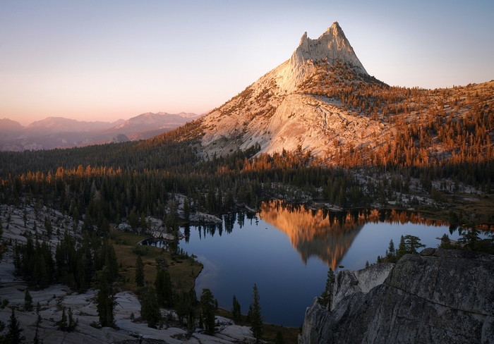 Majestic Mountain Reflected in a Serene Lake at Sunset