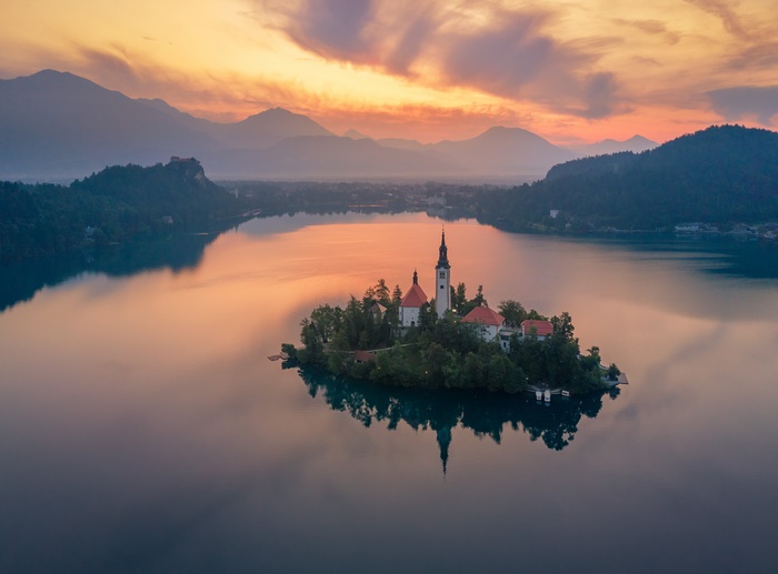 Sunrise over Lake Bled with Assumption of Mary Church